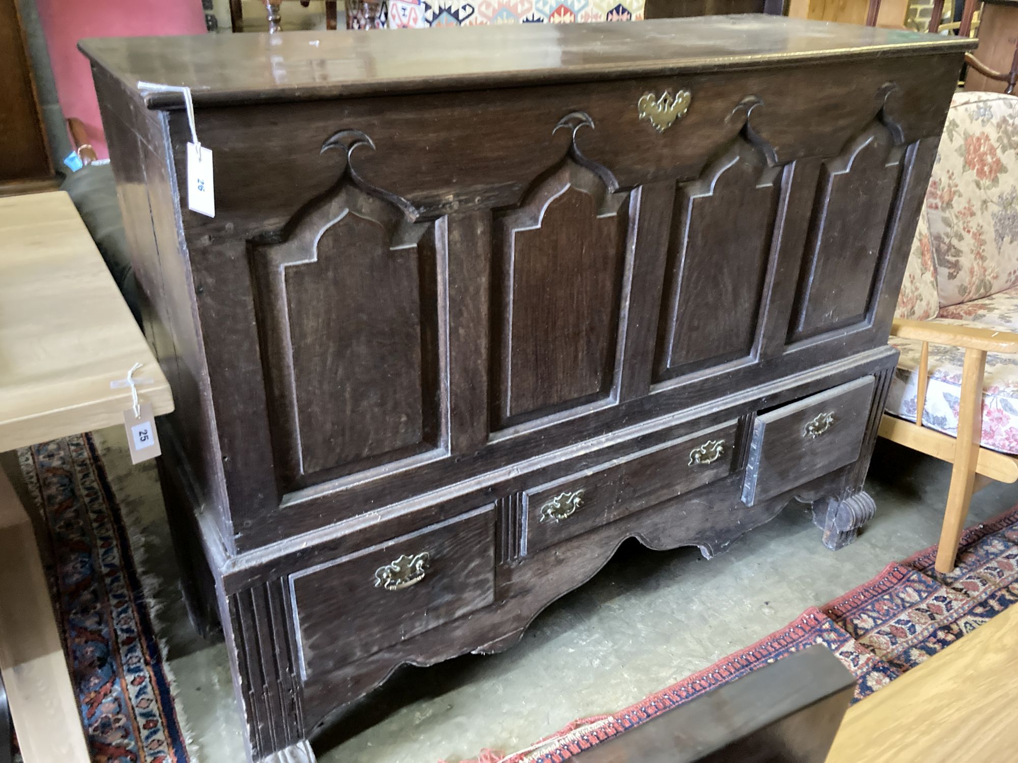 An 18th century oak mule chest, width 140cm, depth 56cm, height 110cm